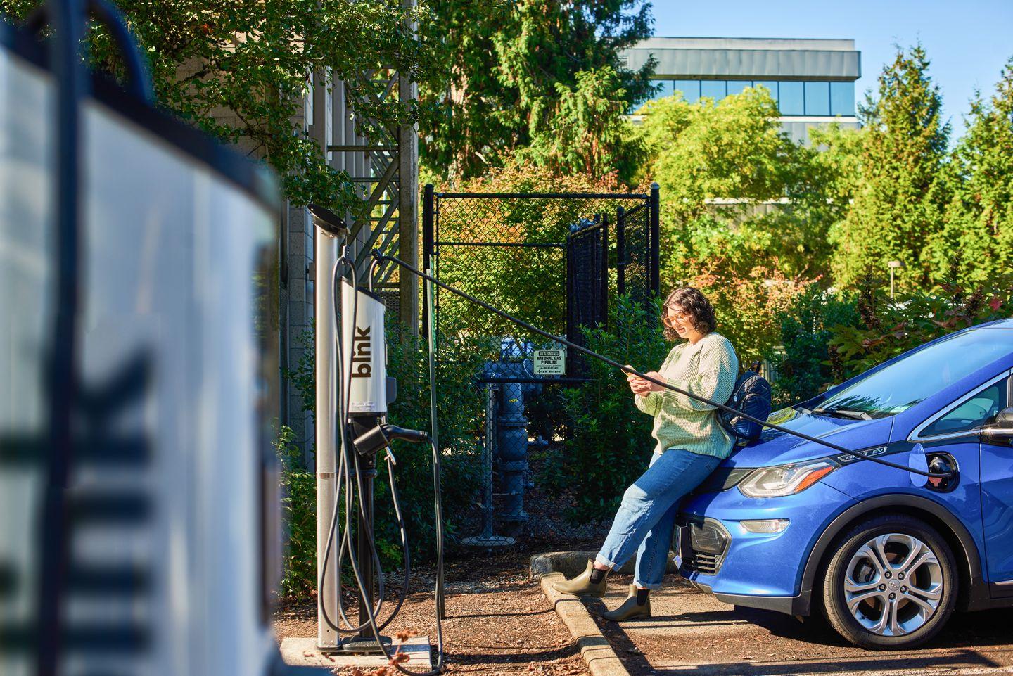 Enjoying texting while your EV getting Charged by Blink Charger